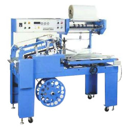 auto sealing and hot shrink packing machine