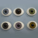 Oval Glass Paperweight Doll Eyes