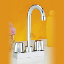two metal handle bar faucets 